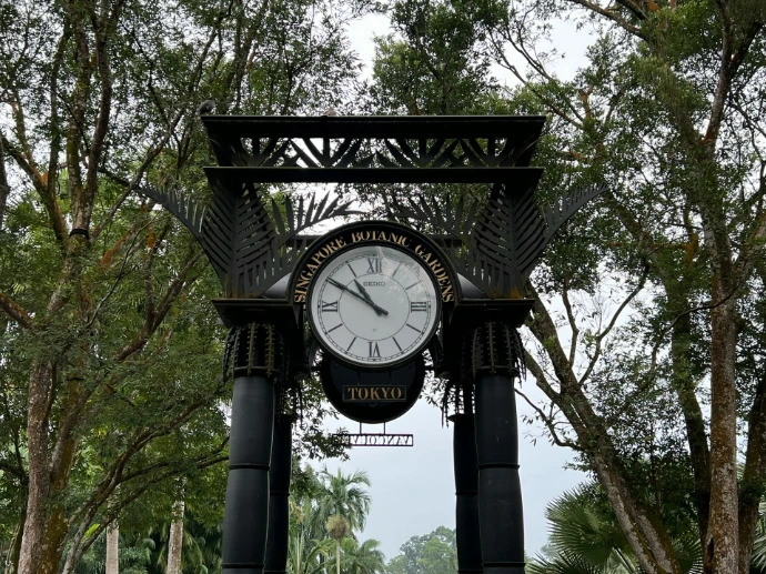 a clock on a pole